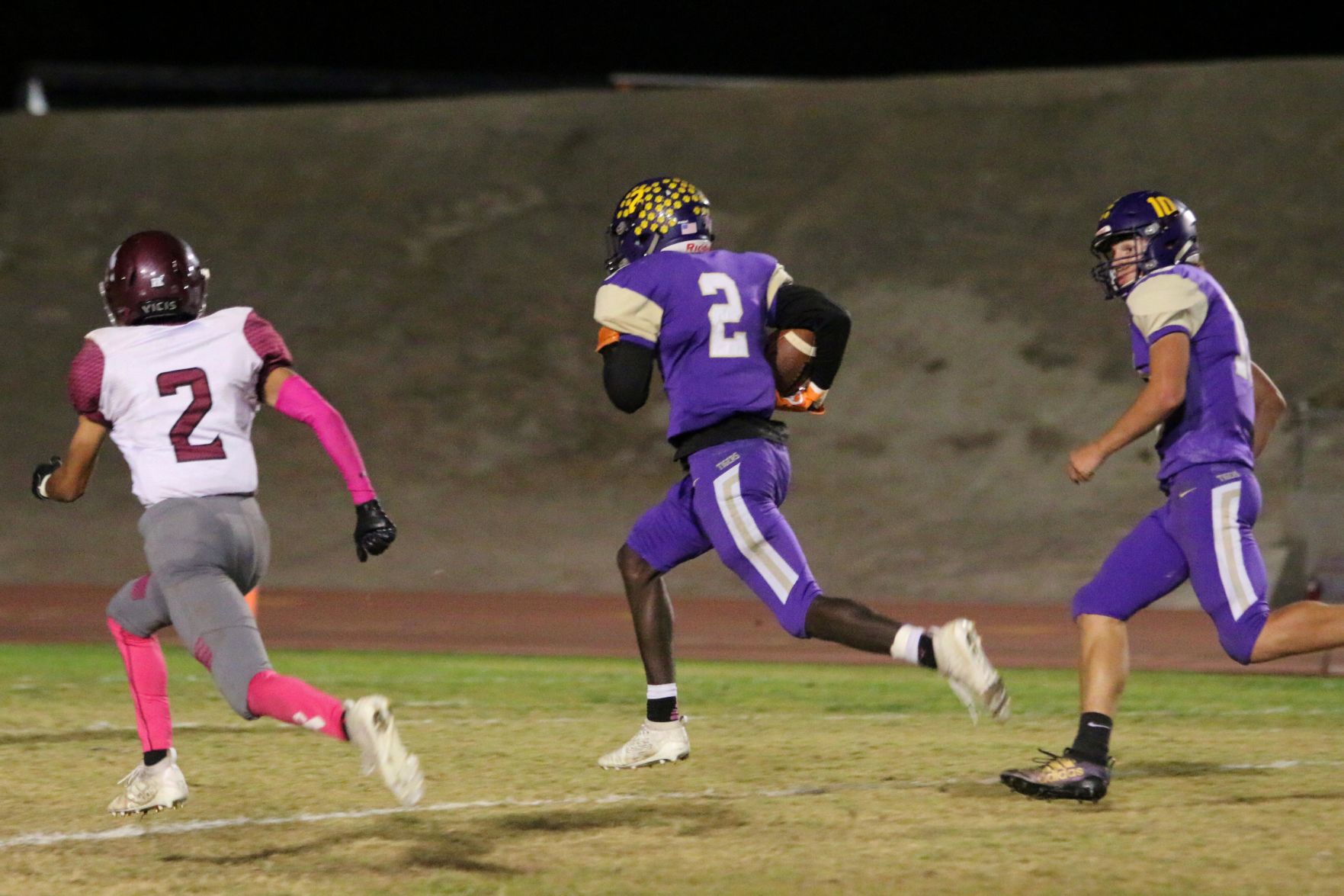 Tigers stay hot with 42-6 rout of Pioneers, clinch playoff spot